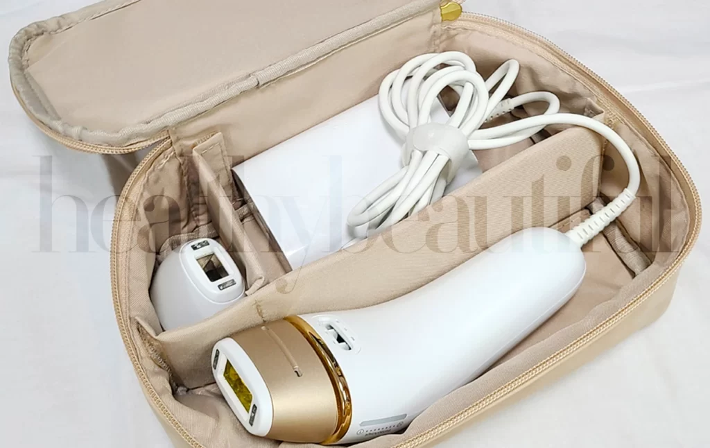 Inside the Beauty Pouch: The BRAUN Silk’n-Expert Pro 5 with the standard head (attached), Precision head, base station, and the mains cord; inside the beauty pouch.
